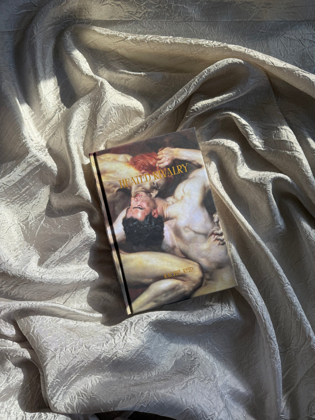 HEATED RIVALRY BY RACHEL REID