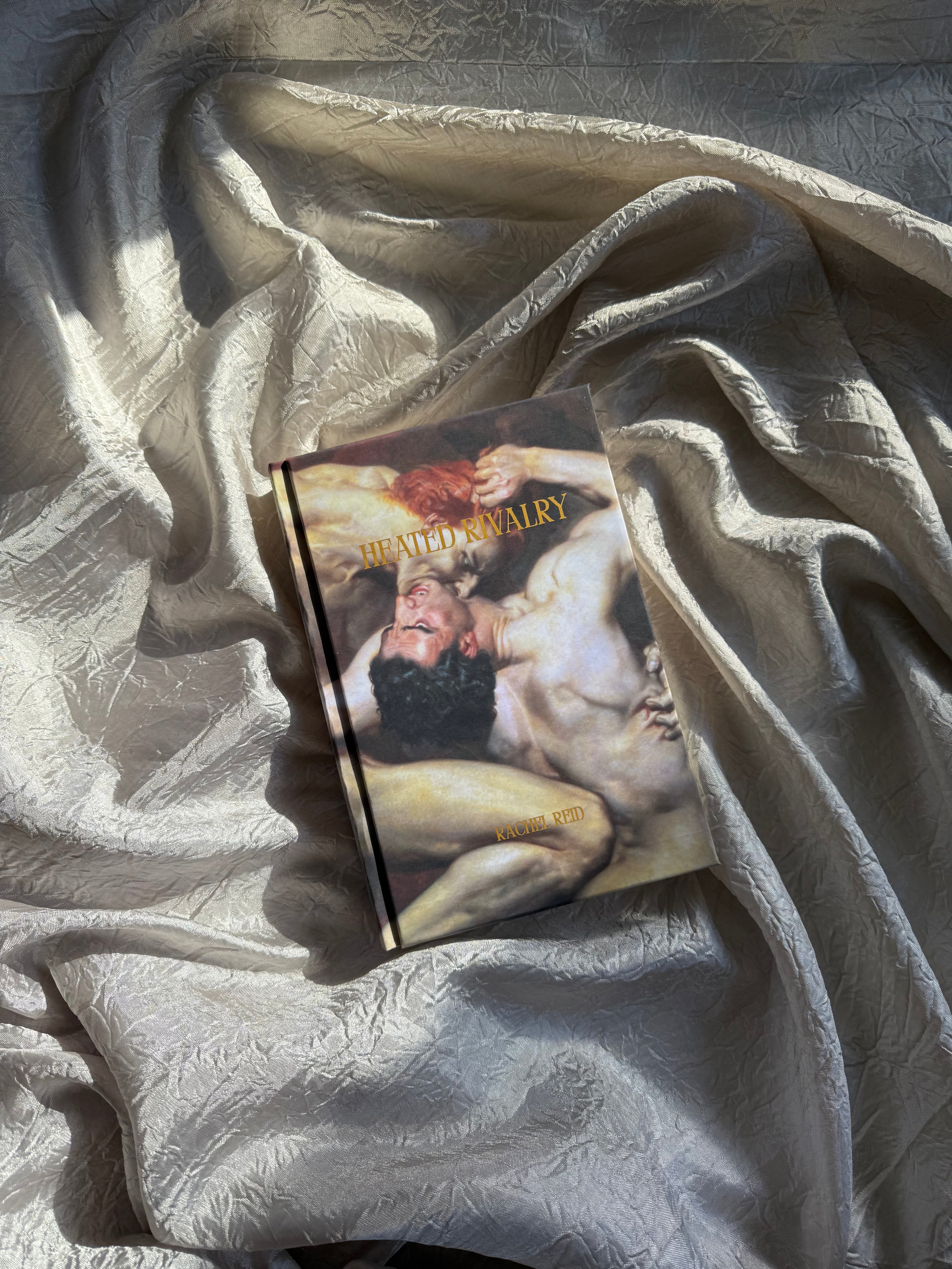 HEATED RIVALRY BY RACHEL REID